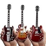 Análisis Exhaustivo de la Gibson ES-335: La Joya del Rock y Su Comparativa con Otros Guitarras Icónicas